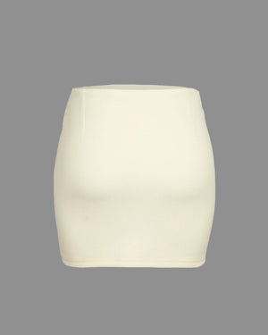 Beige mini skirt on a gray background