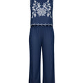 Navy blue jumpsuit with white floral embroidery on a white background