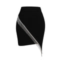 Black skirt with silver fringe on a white background