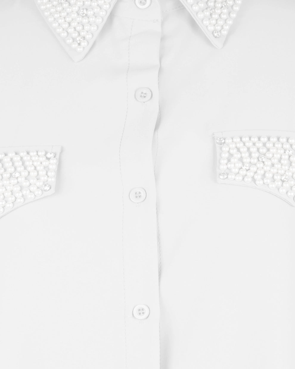 White shirt with decorative cut-out shoulders and sleeves on a white background