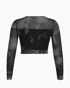 Black and gray camouflage long-sleeve top on a white background