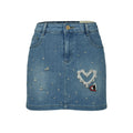 Blue denim skirt with decorative heart and gemstones on a white background