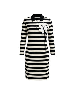Black and white striped dress with a collar and decorative bow on a white background