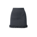 Black skirt with ruffled hem on a white background