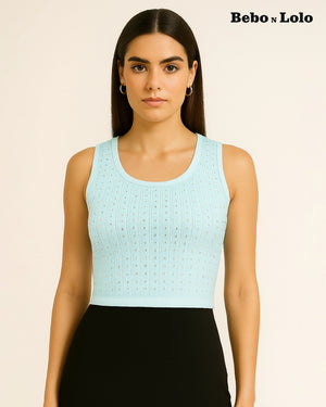 Woman wearing a light blue sleeveless top with a beige background and 'Bebo n Lolo' branding.
