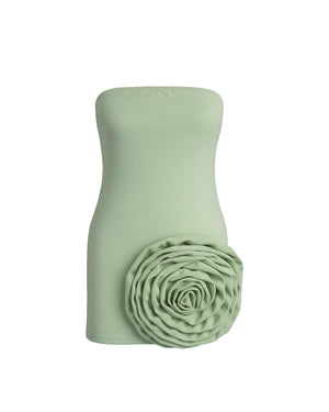 Green strapless top with a floral detail on a white background