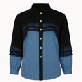 Black and blue shirt with gold buttons on a white background