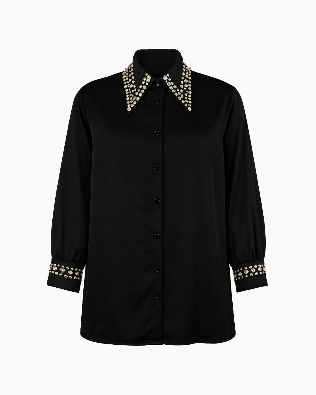 Black shirt with decorative collar and cuffs on a white background