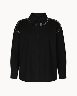 Black shirt with studded details on a white background