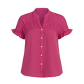 Pink blouse with ruffled sleeves on a white background