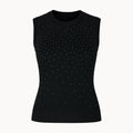 Black sleeveless top with small white embellishments on a white background