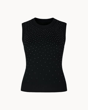 Black sleeveless top with small white embellishments on a white background