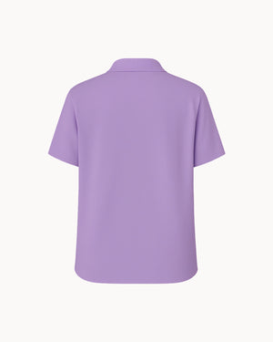 Purple polo shirt on a white background