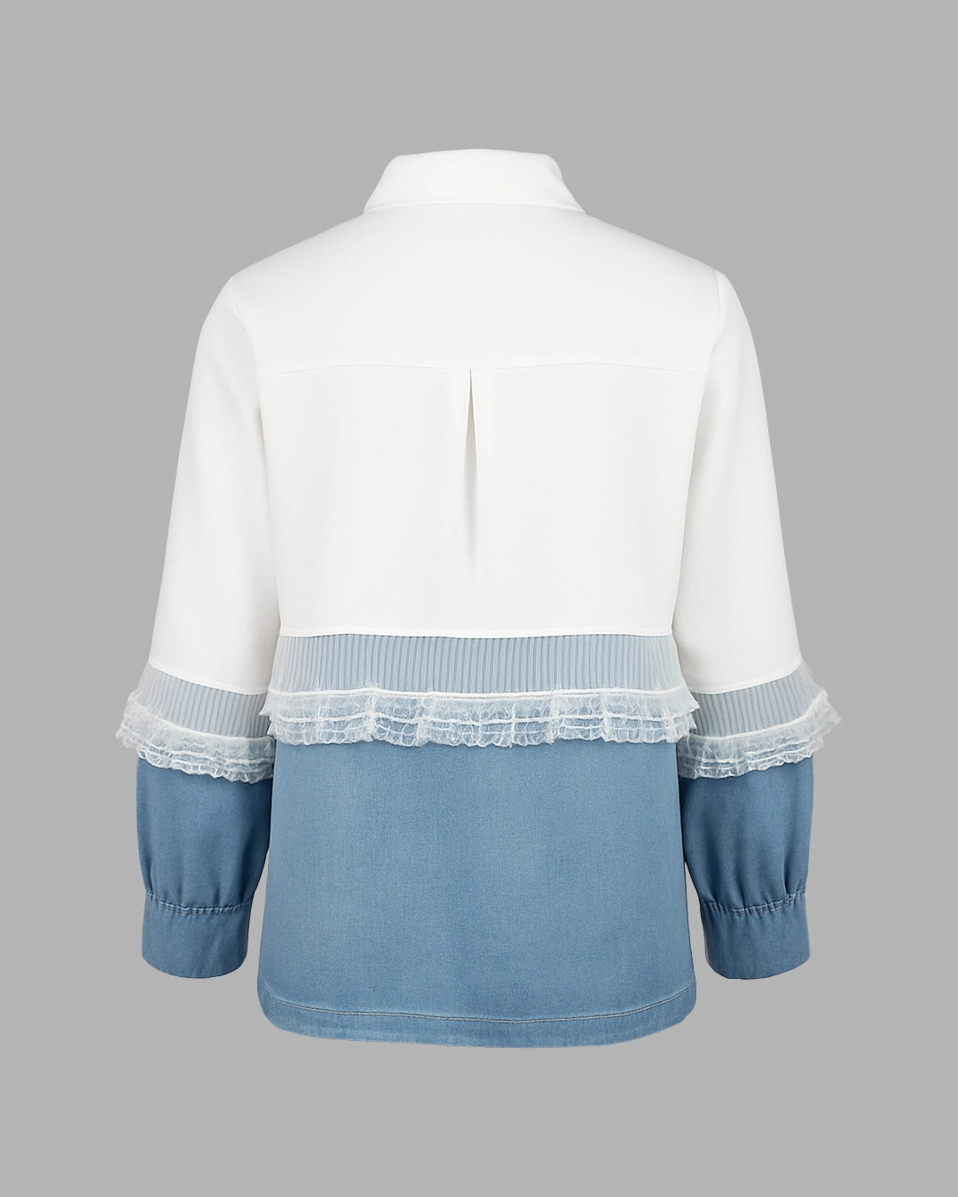 White and blue shirt with lace details on a gray background