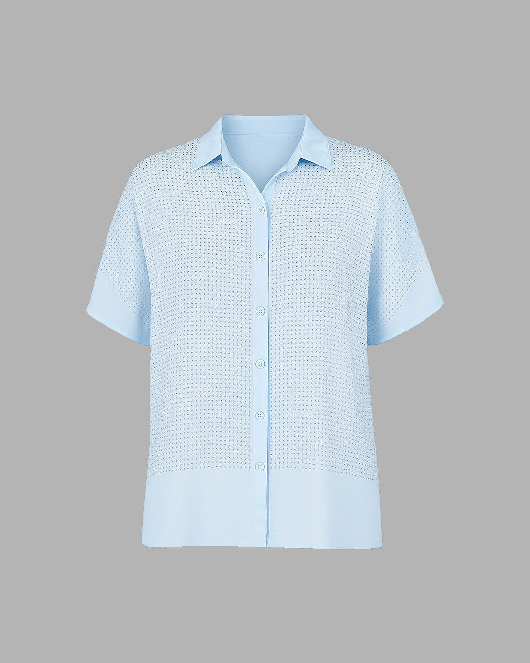 Light blue short-sleeve shirt with a subtle pattern on a gray background