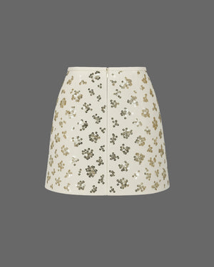 Floral patterned skirt on a gray background