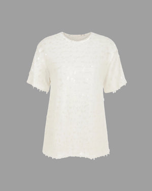 White t-shirt with lace details on a gray background