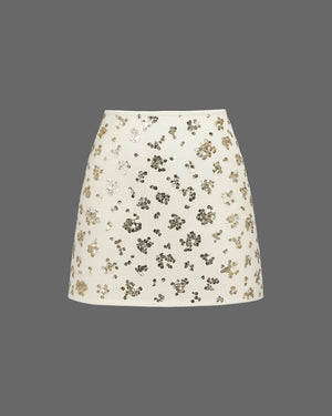 Floral patterned skirt on a gray background