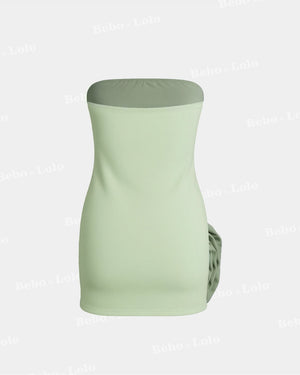 Light green strapless top on a white background