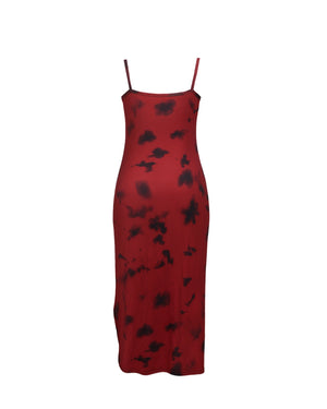 Red dress with black floral pattern on a white background
