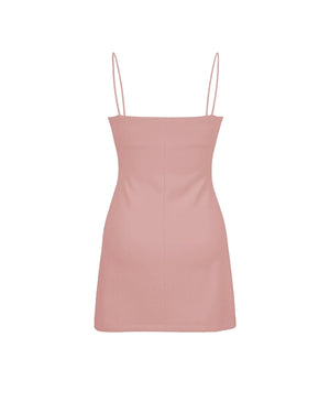 Pink dress with thin straps on a white background