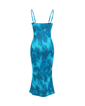 Blue patterned dress on a white background