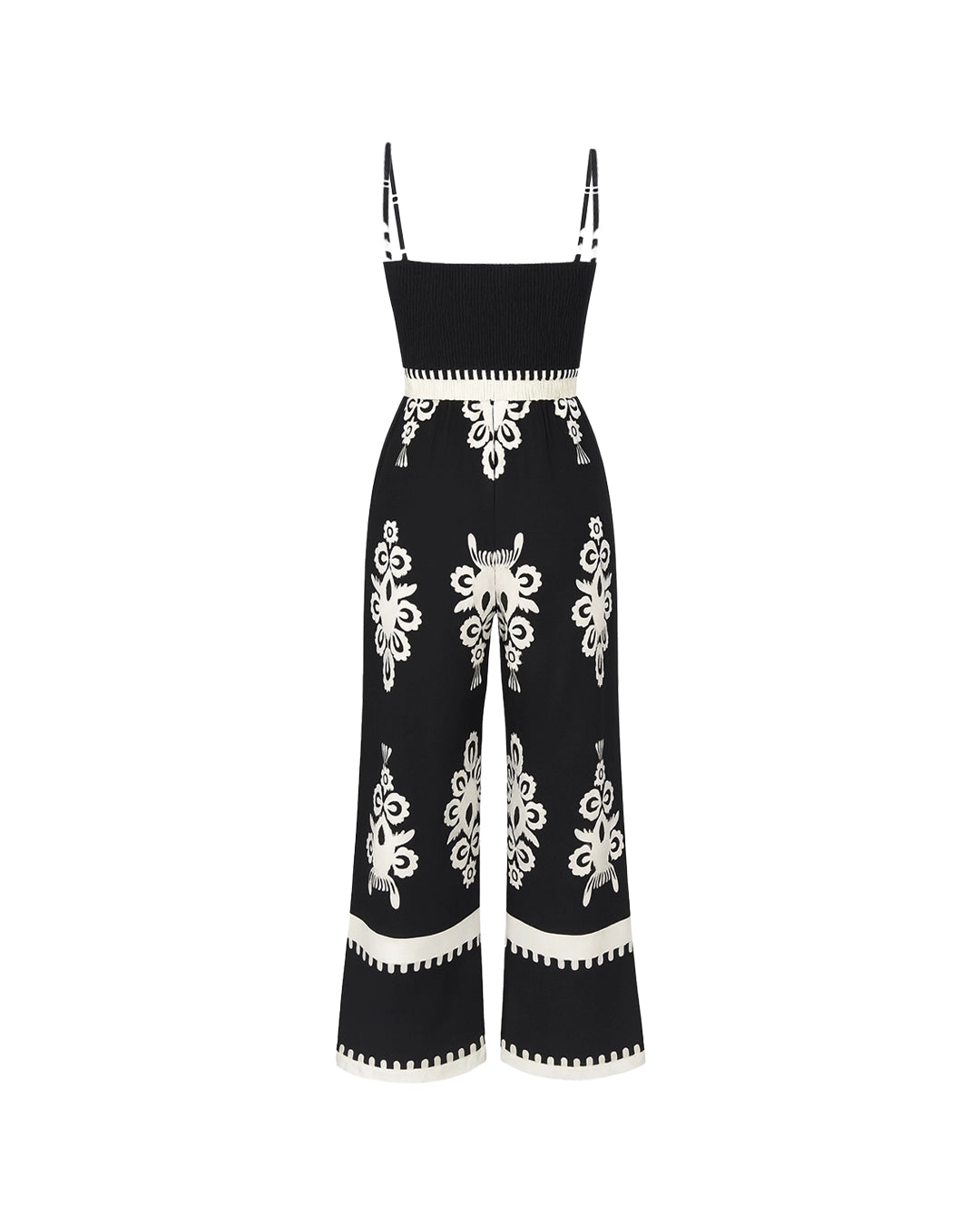 Black jumpsuit with white floral patterns on a white background