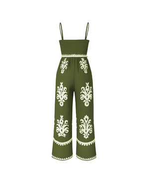 Green jumpsuit with white patterns on a white background