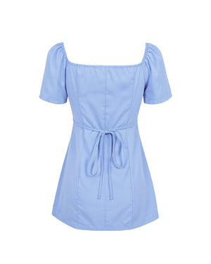 Light blue dress with puff sleeves on a white background