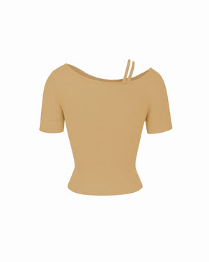 Beige top with thin straps on a white background