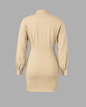 Beige dress on a gray background