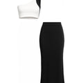 White one-shoulder top and black pencil skirt on a white background