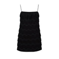 Black zigzag patterned dress on a white background