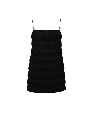 Black zigzag patterned dress on a white background