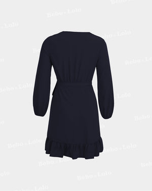 BeboNLolo blue  wrap dress with ruffle hem and tie-back detail – Back View