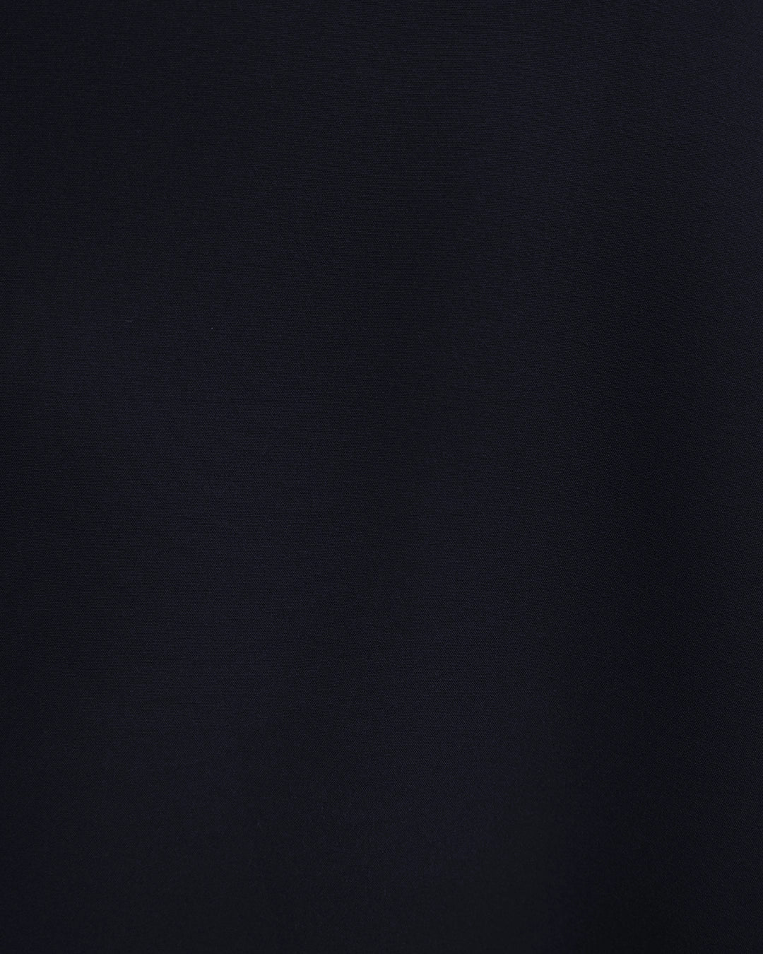 BeboNLolo blue  wrap dress close-up showing V-neckline and ruffle fabric detail – Close-Up View