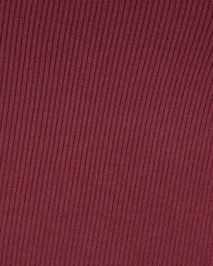 Close-up of ribbed maroon fabric texture