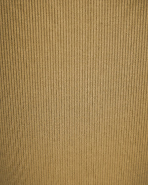 Close-up of a textured brown fabric surface