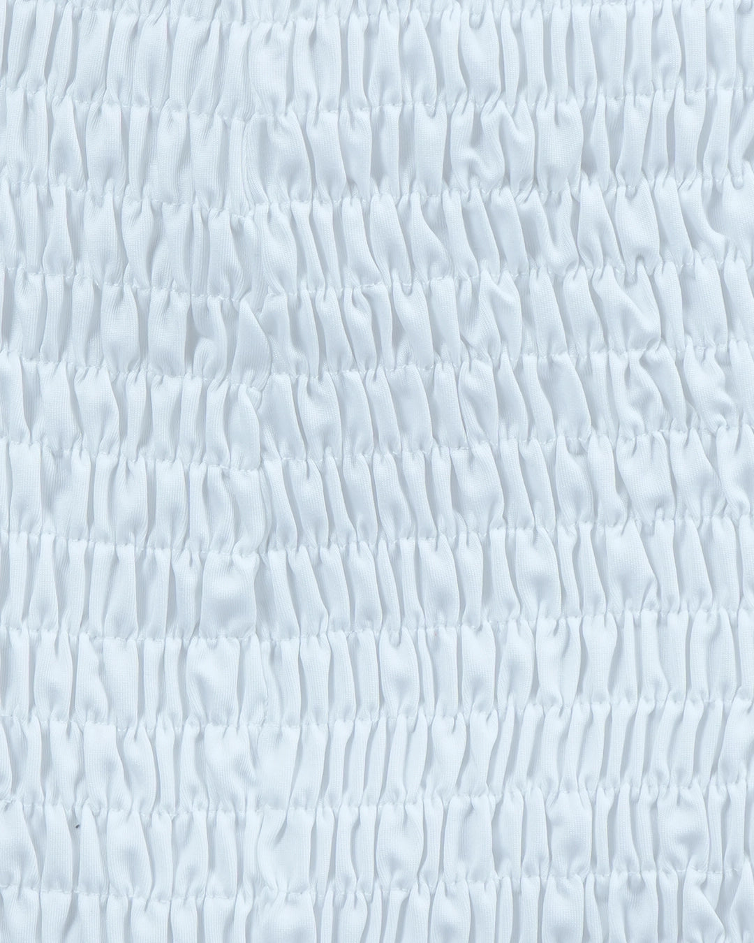 Textured light blue background with wavy pattern