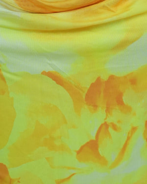 Close-up of a yellow fabric with floral patterns