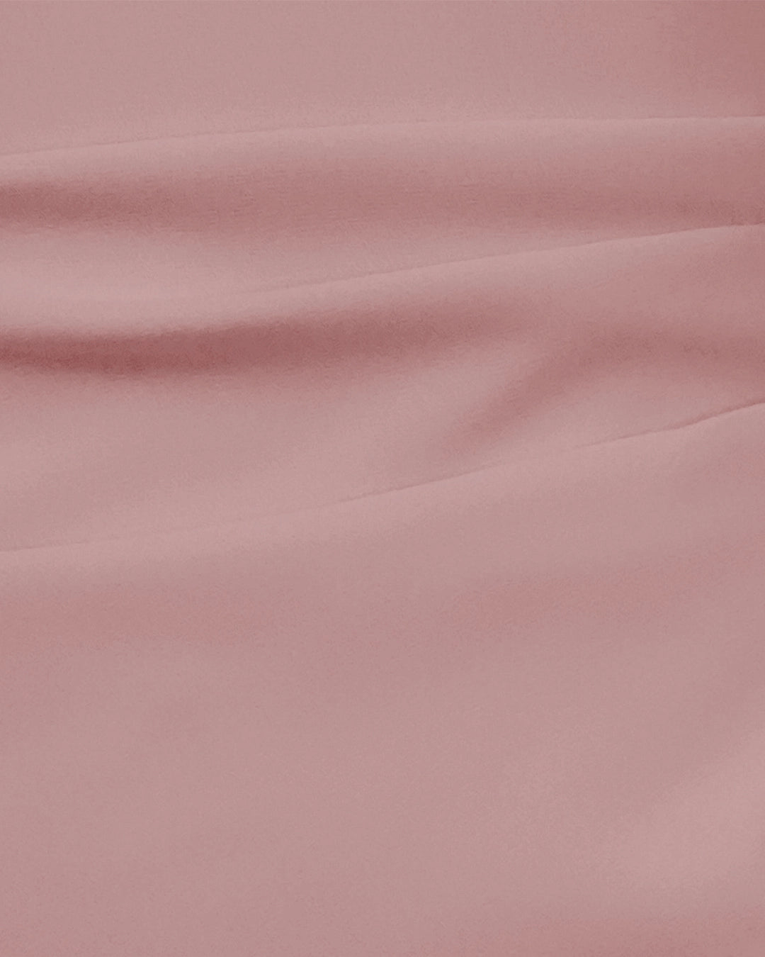 Close-up of pink fabric with visible texture