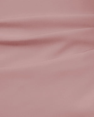 Close-up of pink fabric with visible texture