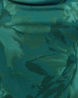 Green floral dress  close up on a white background
