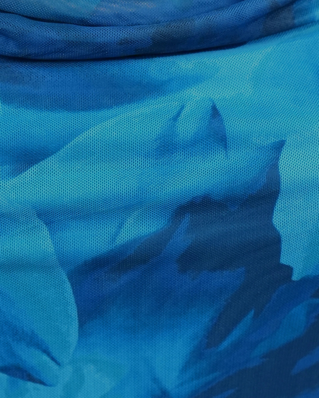 Close-up of blue fabric with a textured pattern