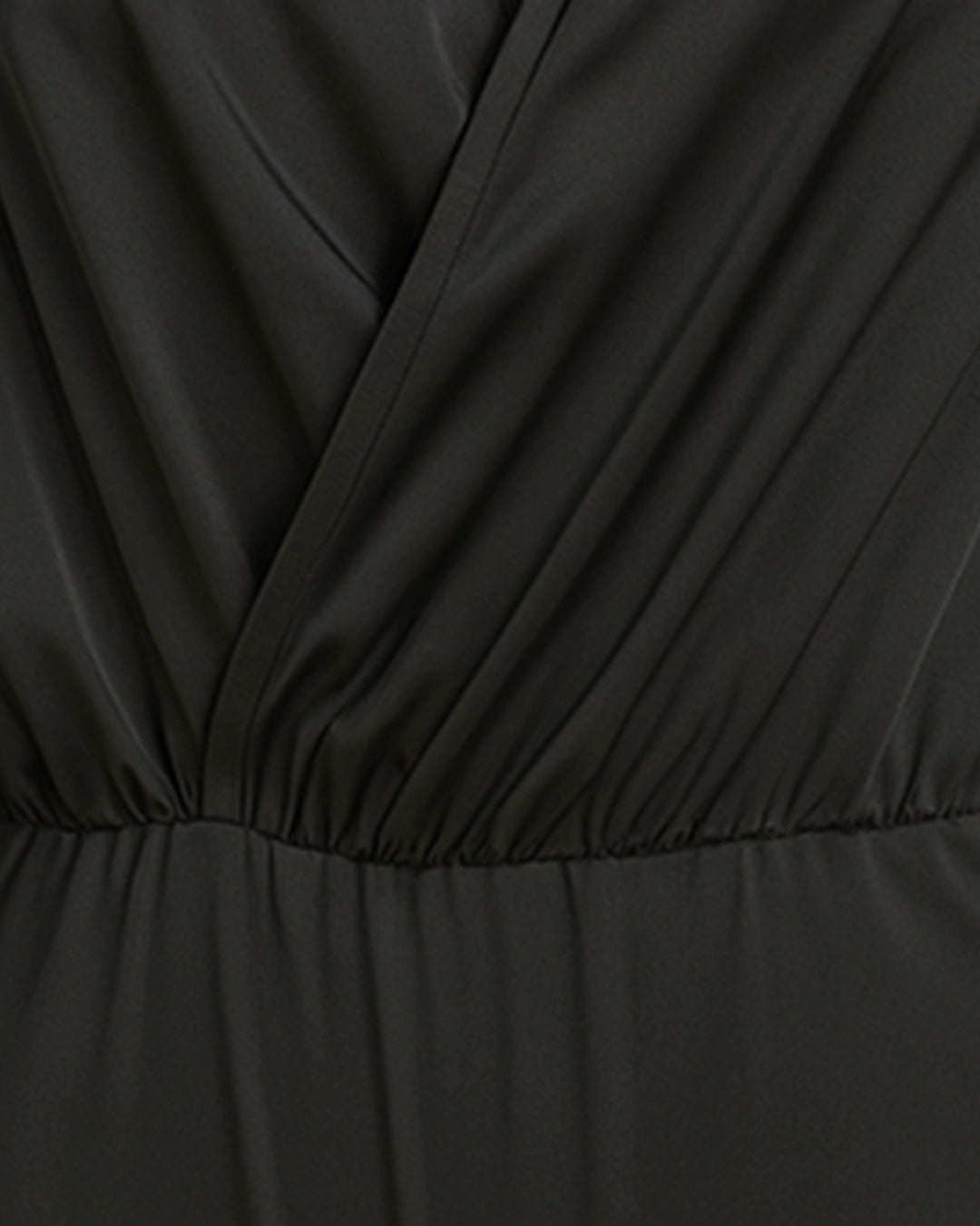 BeboNLolo black wrap bodysuit close-up highlighting V-neckline and ruched fabric detail – Close-Up View