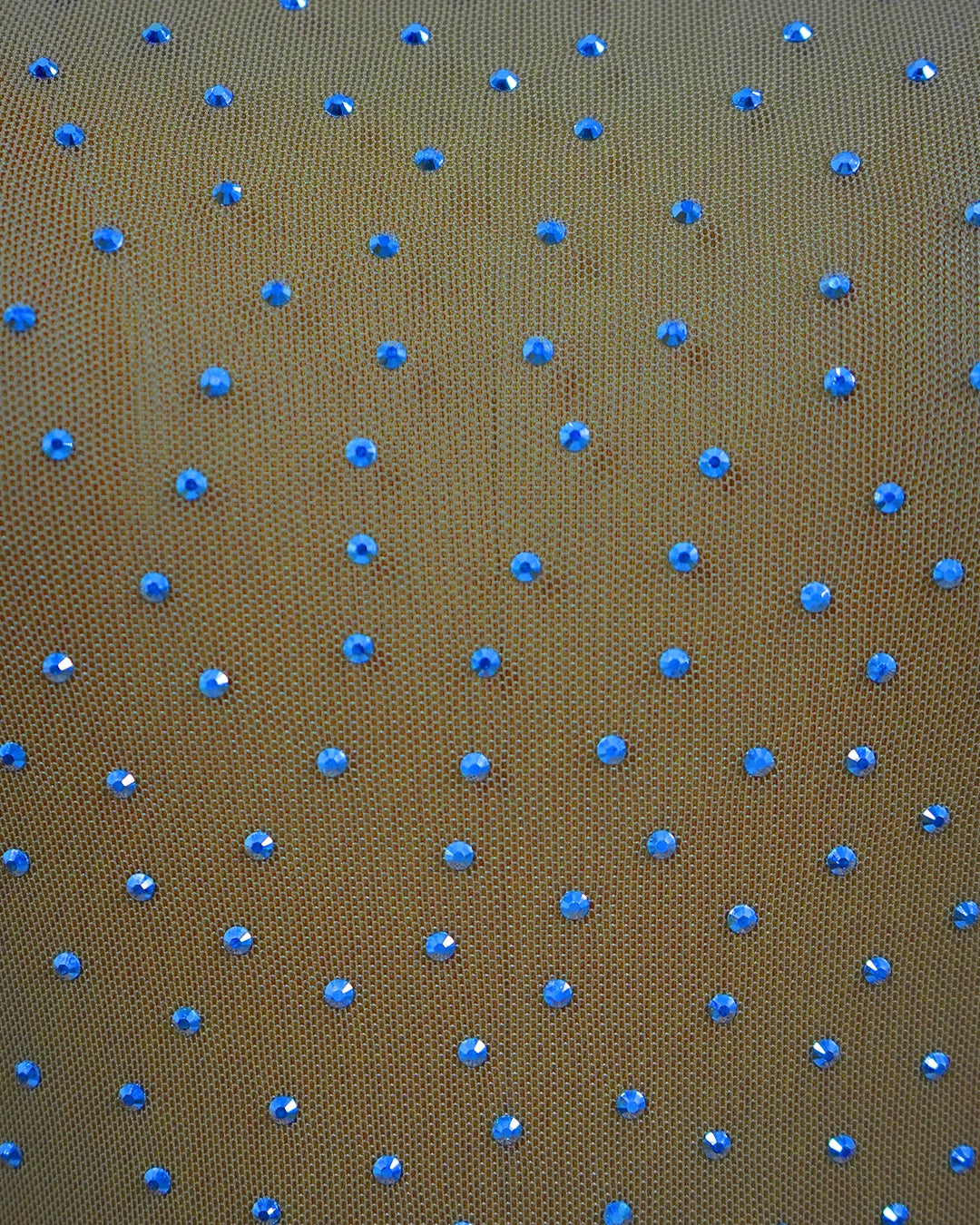 Brown fabric with small blue polka dots
