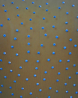 Brown fabric with small blue polka dots