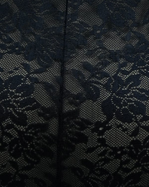 Close-up of black lace fabric with floral patterns