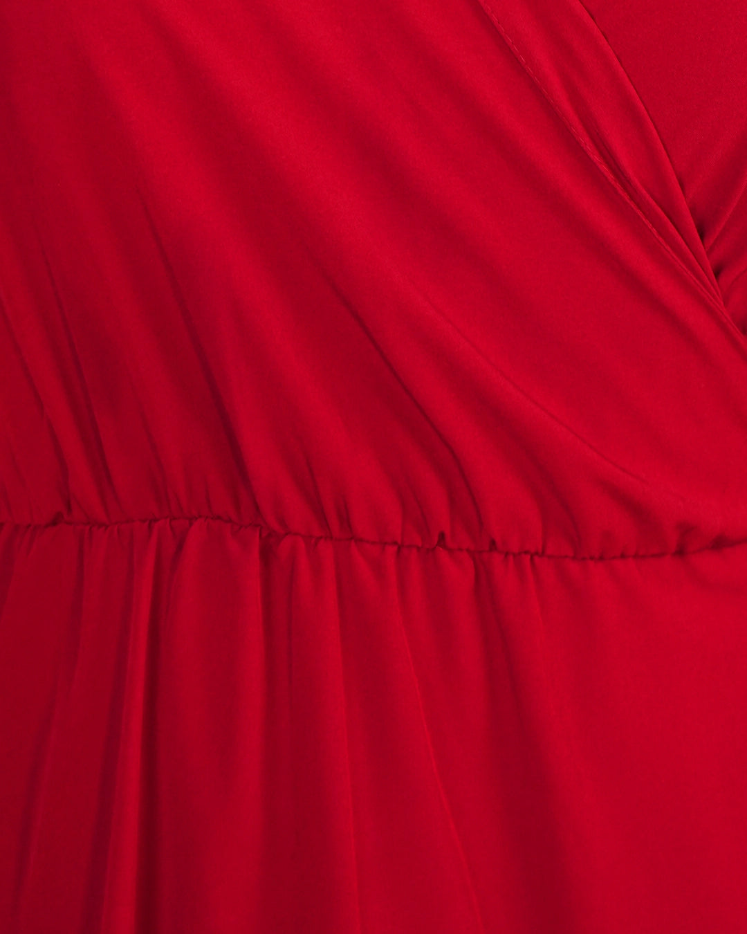 BeboNLolo red wrap dress close-up showing V-neckline and ruffle fabric detail – Close-Up View