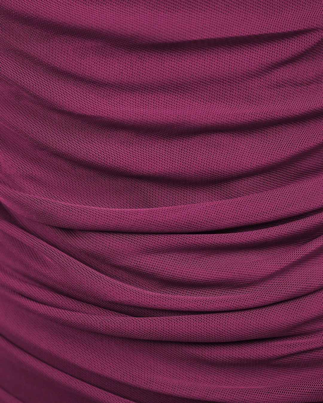 Close-up of purple fabric with folds